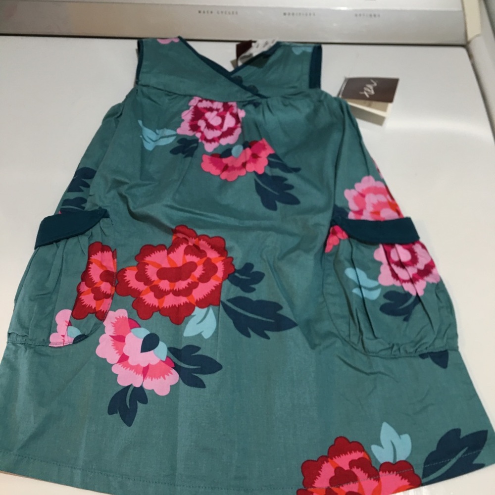 Beautiful floral dress by Tea.